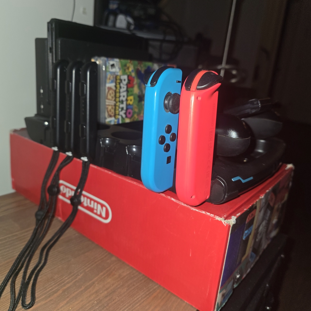 Nintendo Red and Blue Switch Console with Joy-Con Controllers and Dock